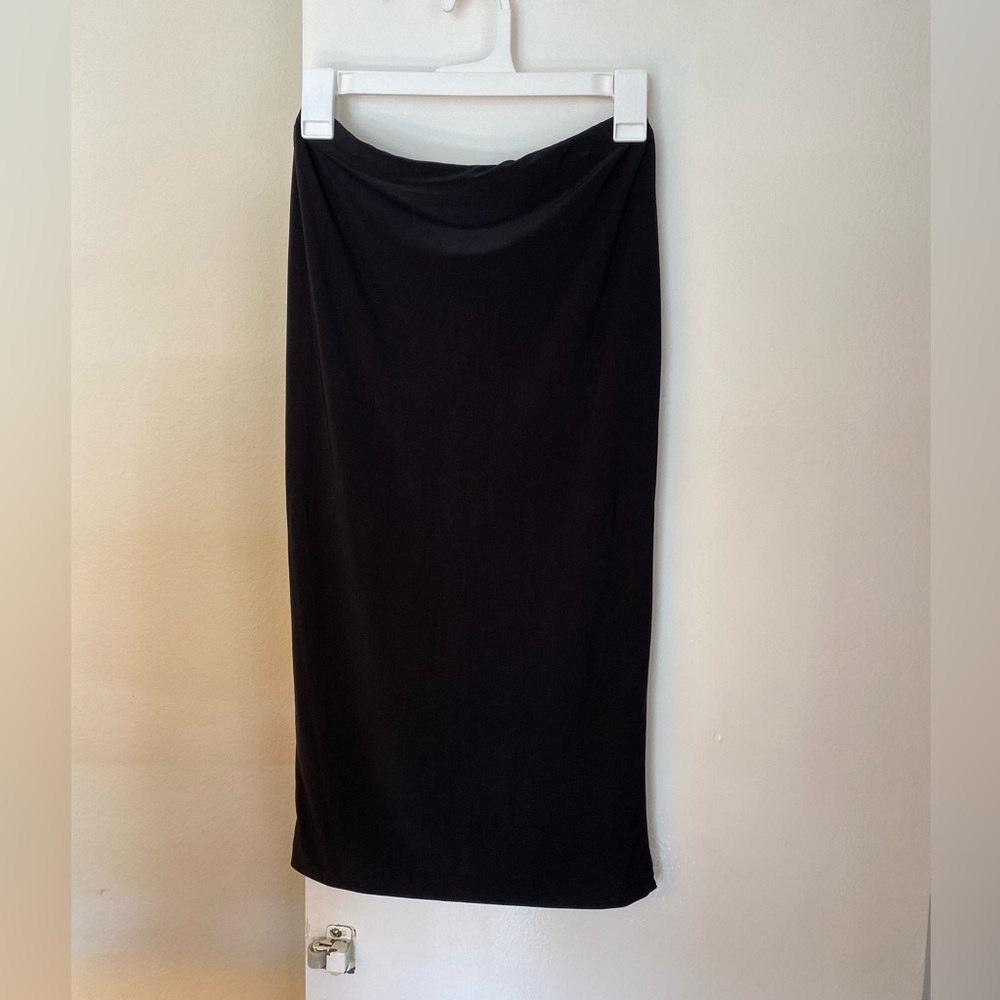 Tight stretchy black midi skirt